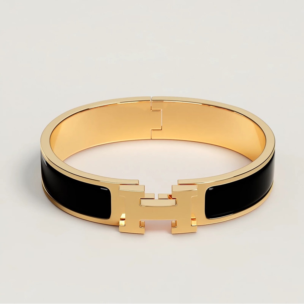 Hermès Clic Clac H black Enamel Gold
Plated Wide Bracelet